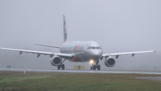 Rainy Conditions made for poor visibility at the Gold Coast Airport, one of the reasons an ILS was needed. Picture Glenn Hampson