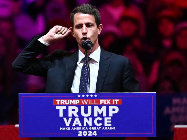 (FILES) US comedian Tony Hinchcliffe speaks during a campaign rally for former US president and Republican presidential candidate Donald Trump at Madison Square Garden in New York on October 27, 2024. Donald Trump was struggling October 28, 2024 to contain the blast radius of a fierce backlash to racist rhetoric targeting Puerto Ricans at his weekend rally, just nine days ahead of a presidential election that could be determined by the Latino vote. (Photo by ANGELA WEISS / AFP)