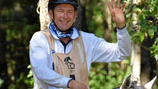 Owner of Stirling Crossing Equestrian Centre Matt Sample musters a smile and wave, during the 2019 Tom Quilty Gold Cup endurance ride. Picture: Donna Jones