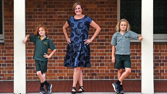 Mum Marie-Therese Tornquist with her sons Kirby, 7, and Kormack, 9 at St Laurence’s College. Picture: AAP image/John Gass