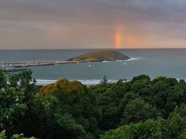 Emilly Hambly with a magnificent photo overlooking Coffs Harbour. Coffs Cover image.