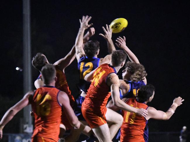 Players fly for the footy in the South Queensland vs North Queensland men's intrastate representative clash at Bond University Oval. Picture: Highflyer Images.