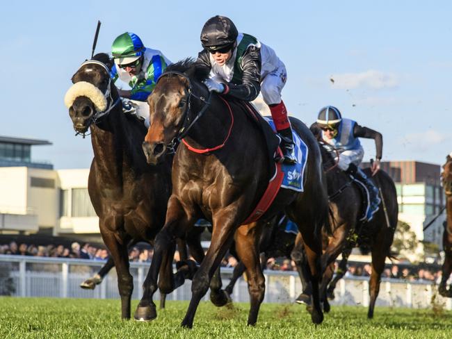 MELBOURNE, AUSTRALIA - SEPTEMBER 02: Craig Williams riding Mr Brightside defeats Luke Nolen riding I Wish I Win (3rd place) in Race 9, the Stow Storage Memsie Stakes, during Melbourne Racing at Caulfield Racecourse on September 02, 2023 in Melbourne, Australia. (Photo by Vince Caligiuri/Getty Images)