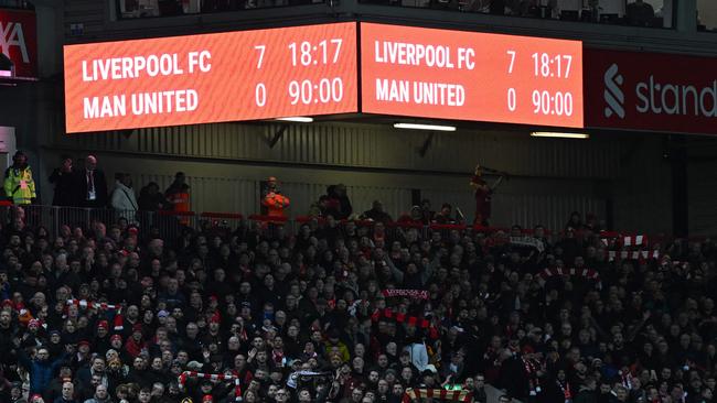 The scoreboard shows the final score. (Photo by Paul ELLIS / AFP)