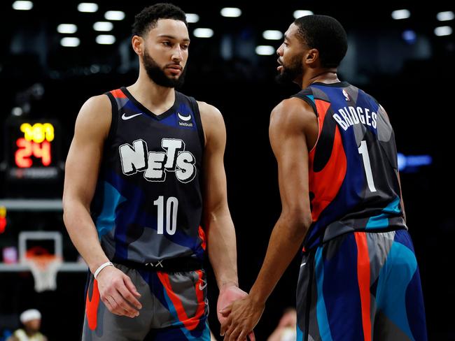 NEW YORK, NEW YORK - JANUARY 29: Mikal Bridges #1 reacts with Ben Simmons #10 of the Brooklyn Nets during the first half against the Utah Jazz at Barclays Center on January 29, 2024 in the Brooklyn borough of New York City. NOTE TO USER: User expressly acknowledges and agrees that, by downloading and/or using this Photograph, user is consenting to the terms and conditions of the Getty Images License Agreement.   Sarah Stier/Getty Images/AFP (Photo by Sarah Stier / GETTY IMAGES NORTH AMERICA / Getty Images via AFP)