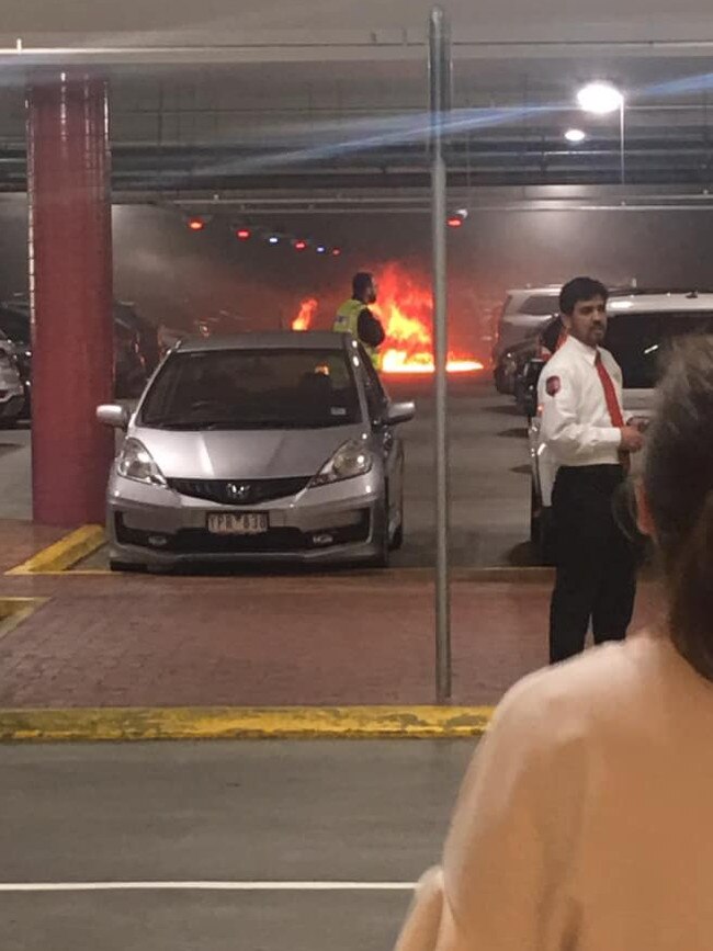 A car on fire in the Chadstone car park. Facebook: MoyraDom Pinto