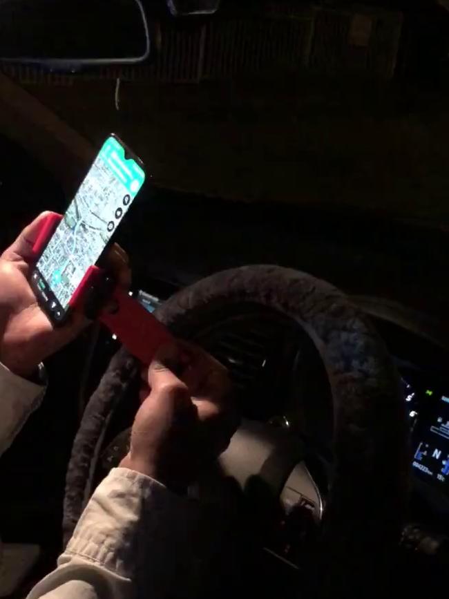 Police were shocked to find the phone attached to the steering wheel.