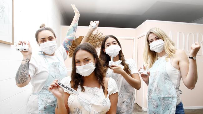 L – R Carla Alderton, Nicole Hague, Lisa Hanson and Kelly Tengdahl prepare for the reopening of Adore Dolls Parlour in Miami. Picture: Tertius Pickard