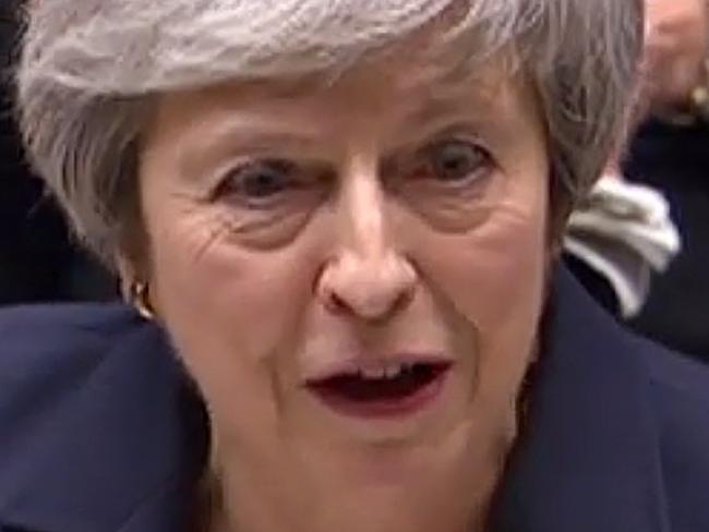 A video grab from footage broadcast by the UK Parliament's Parliamentary Recording Unit (PRU) shows Britain's Prime Minister Theresa May as she speaks in the House of Commons in London on December 4, 2018, at the beginning of a debate on the Brexit deal, ahead of the 'Meaningful Vote'. - Britain's government suffered a stinging rebuke from MPs ahead of Tuesday's momentous Brexit debate, exposing Prime Minister Theresa May's lack of support in parliament. The House of Commons voted 311-293 to censure the government for failing to publish its full legal advice about the divorce deal May struck last month with the European Union. (Photo by HO / various sources / AFP) / RESTRICTED TO EDITORIAL USE - NO USE FOR ENTERTAINMENT, SATIRICAL, ADVERTISING PURPOSES - MANDATORY CREDIT " AFP PHOTO / PRU "