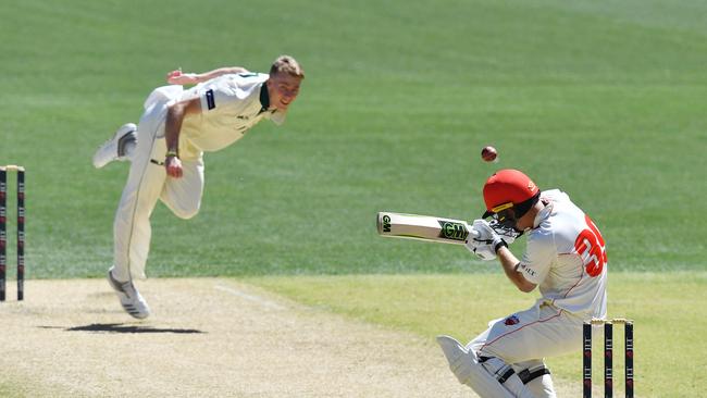 Riley Meredith bowls to Conor McInerney of the Redbacks during a Sheffield Shield match between South Australia and Tasmania. Picture: AAP/DAVID MARIUZ