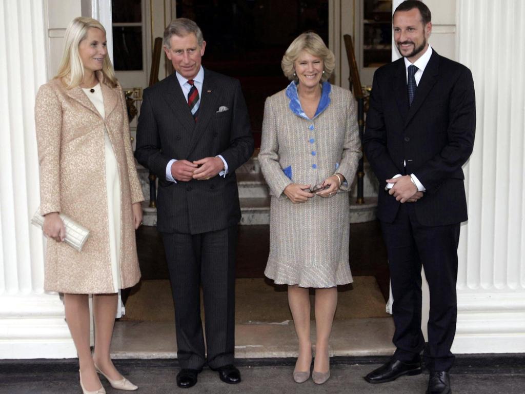 The Norwegian royal couple in the garden of Clarence House, London, during a visit to see then-Prince Charles and Camilla. Picture: AP Photo/Michael Dunlea, Pool