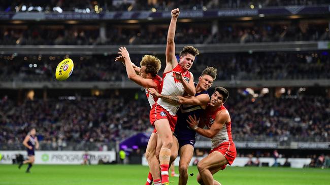 Sydney Swans and Fremantle Dockers at their game in Fremantle last month. Both teams will now head to Cairns. Picture: AFL