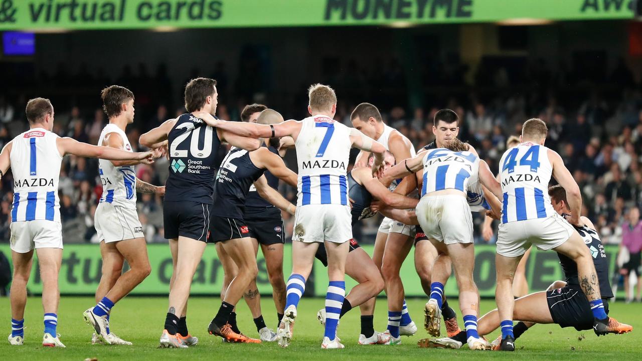 Lewis Young had to deal with heavy contact from every angle. Photo by Michael Willson/AFL Photos via Getty Images.