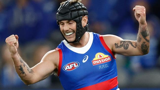 MELBOURNE, AUSTRALIA - JUNE 18: Caleb Daniel of the Bulldogs celebrates a goal during the 2023 AFL Round 14 match between the North Melbourne Kangaroos and the Western Bulldogs at Marvel Stadium on June 18, 2023 in Melbourne, Australia. (Photo by Michael Willson/AFL Photos via Getty Images)