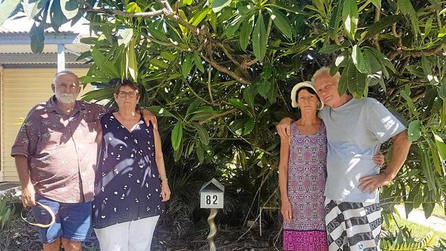 TRADING PLACES: Two sets of Bowen neighbours are facing an uphill battle in legal fees to swap land titles after realising they are living in each others home. Pictured are next door neighbours Eddie Jones, Lyn Jones, Karen Ford and Jeff Ford.