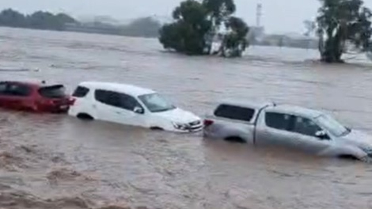 Footage of cars, homes submerged by floods