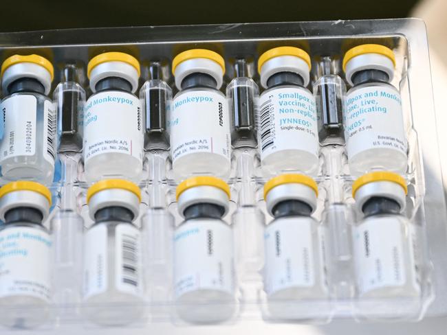 (FILES) This file photo taken on August 9, 2022 shows vials of the JYNNEOS Monkeypox vaccine are prepared at a pop-up vaccination clinic in Los Angeles, California. Shares of the pharmaceutical laboratories of Bavarian Nordic in Denmark, which manufactures a specific vaccine against the mpox, jumped up on August 15, 2024 following the decision of the World Organization of Health WHO to consider the resurgence of monkeypox cases together with an urgent need for health care in the world. A surging mpox outbreak in Africa, which was declared an emergency by the continent's health agency on August 13, is being driven by a new, more transmissible strain of the virus. The Africa Centres for Disease Control and Prevention (Africa CDC) declared its first-ever Public Health Emergency of Continental Security (PHECS) for the deadly disease. (Photo by Patrick T. FALLON / AFP)