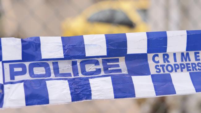 Police are searching two neighbouring properties in Lalor.