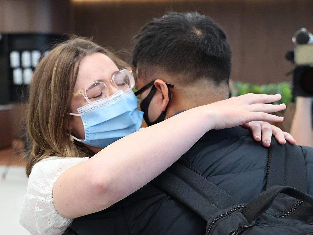 Isabella Hill and Ryan Nguyen back together at Adelaide Airport. Picture: NCA NewsWire / David Mariuz