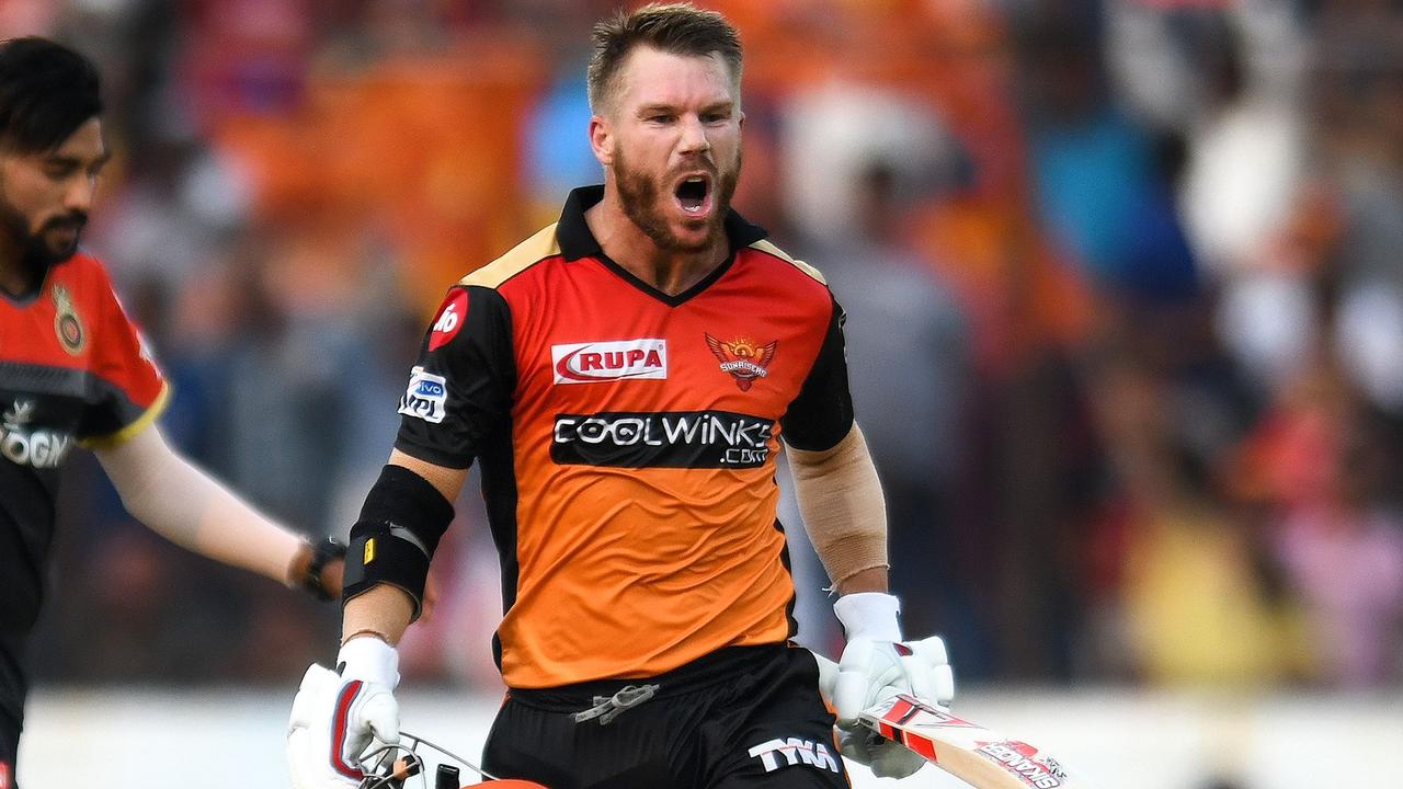 David Warner celebrates scoring a century in the IPL.