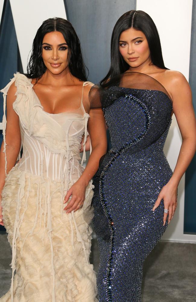 Kim Kardashian and Kylie Jenner posed together on the grey carpet. Picture: AFP