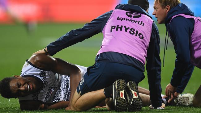 Geelong’s Esava Ratugolea after breaking his leg.