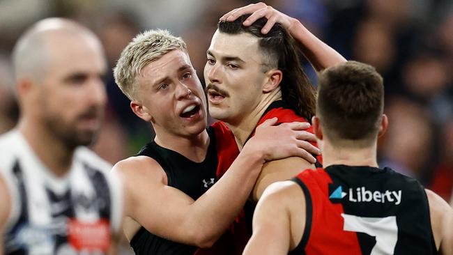 Bombers talls Nate Caddy (left) and Sam Draper both kicked important goals in Essendon’s 12-point win over Collingwood on Friday night. Picture: Michael Willson / Getty Images