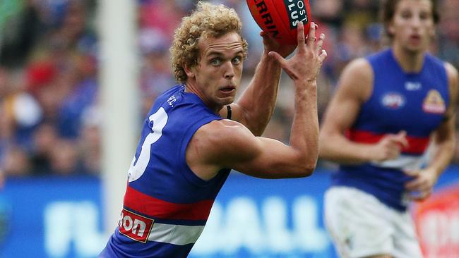 AFL Round 2 - Richmond v Western Bulldogs at MCG, Mitch Wallis in action. 11th April 2015. Picture: Colleen Petch.