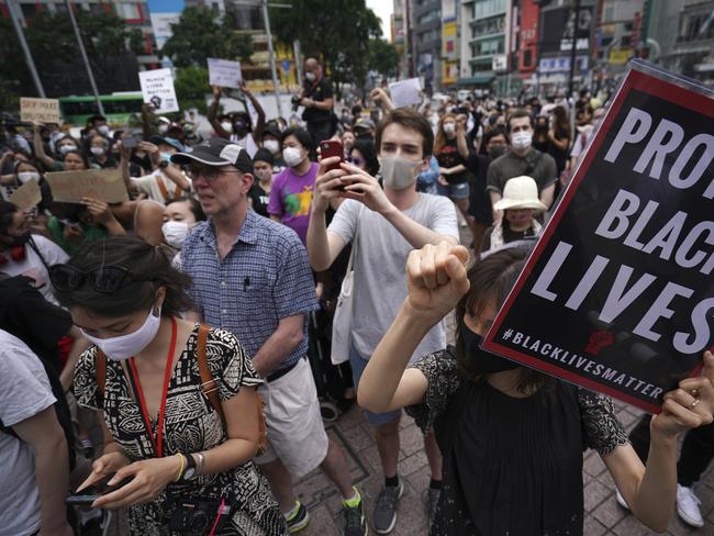 People gather to protest during a solidarity rally for the death of George Floyd in Tokyo. Picture: AP