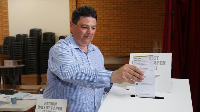 South Barwon Liberal candidate Andrew Katos casts his vote at the Highton polling booth. Picture: Mark Wilson