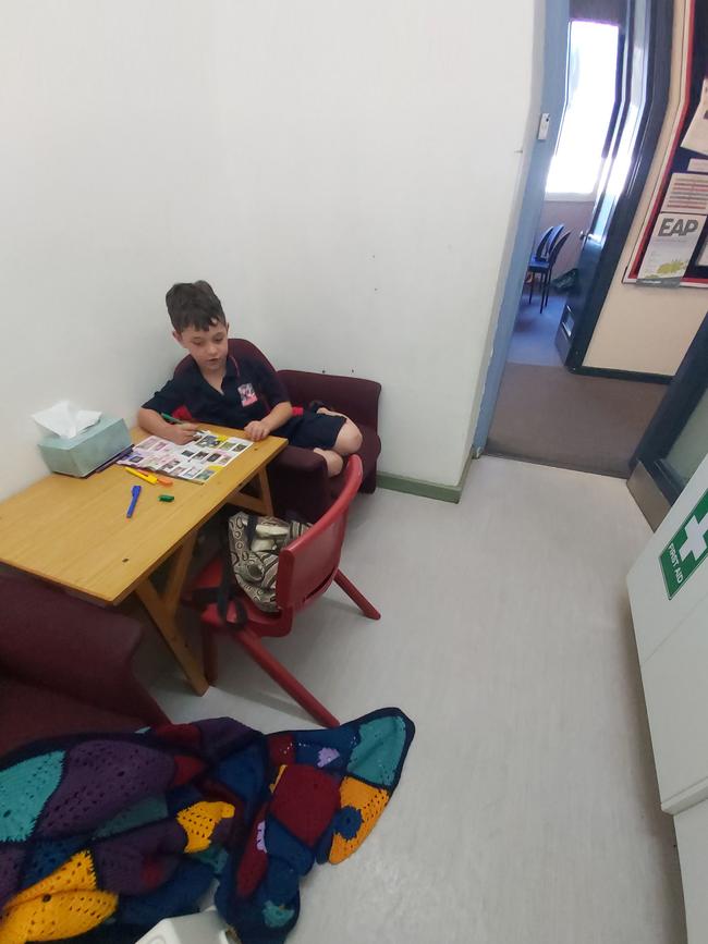 Declan in the first-aid room where he spends lunch and recess . Picture: Supplied