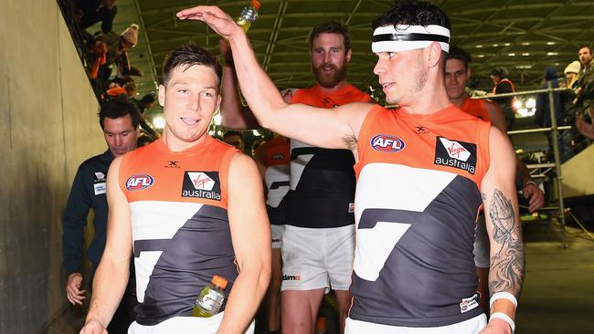 GWS has informed the AFL of an incident which saw a Western Bulldogs fan pour beer over Giants forward Toby Greene. In this post-match photo Nathan Wilson raises his hand over the head of Greene. (Photo by Quinn Rooney/Getty Images)