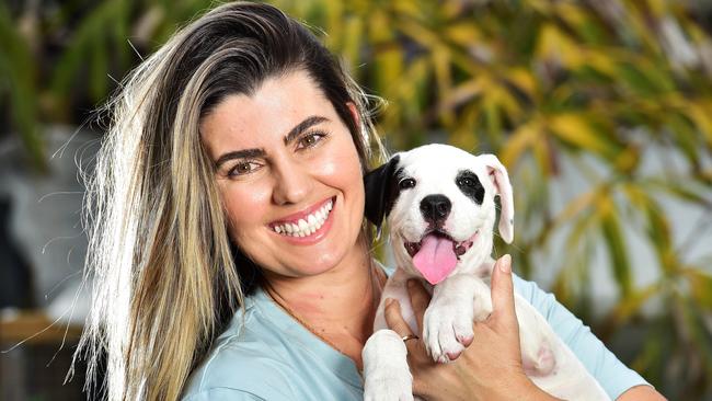 Brooke Winterstein pictured with a foster puppy ready to be adopted. Picture: Shae Beplate.