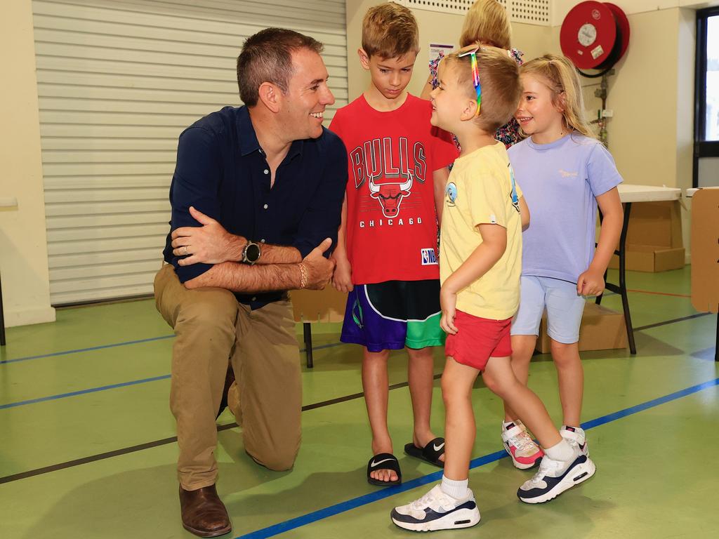 Treasurer Jim Chalmers took kids Jack, 4, Annabel, 6, and Leo, 8, when he and his wife Laura voted in the Voice referendum last Saturday at Springwood Central State School. Picture: Adam Head