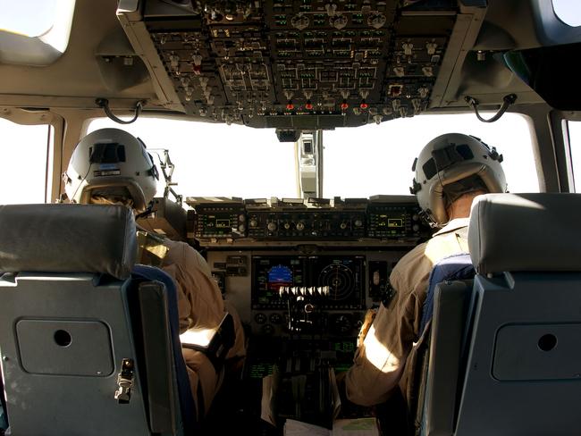 The flightdeck of a Royal Australian Air Force C-17 Globemaster en route to Erbil, Northern Iraq, with a shipment of military equipment.