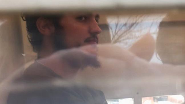 Radwan Dakkak is driven to Bankstown Local Court in a prison van yesterday. Picture: Dylan Robinson.