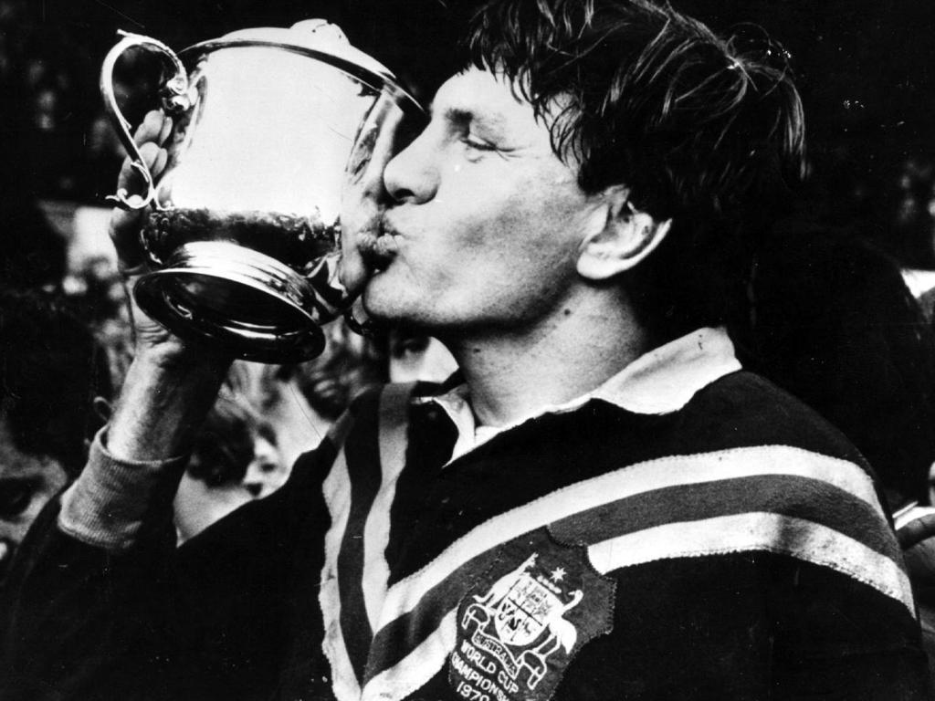 Captain Ron Coote kisses World Cup trophy after Australia defeated England in final in Leeds in 1970.