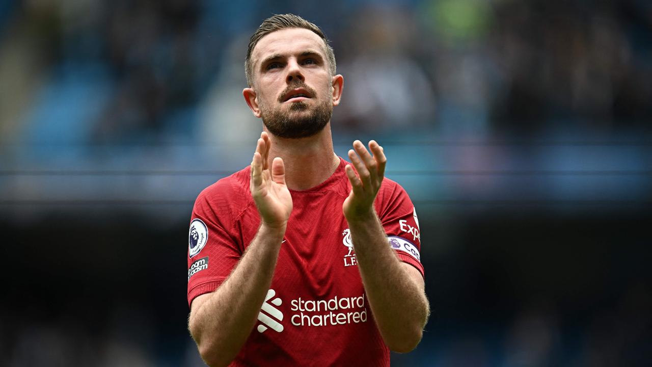 (FILES) Liverpool's English midfielder Jordan Henderson applauds fans on the pitch after the English Premier League football match between Manchester City and Liverpool at the Etihad Stadium in Manchester, north west England, on April 1, 2023. Liverpool captain Jordan Henderson has completed his move to Saudi Pro League side Al-Ettifaq, both clubs announced on Wednesday, July 27. (Photo by Paul ELLIS / AFP) / RESTRICTED TO EDITORIAL USE. No use with unauthorized audio, video, data, fixture lists, club/league logos or 'live' services. Online in-match use limited to 120 images. An additional 40 images may be used in extra time. No video emulation. Social media in-match use limited to 120 images. An additional 40 images may be used in extra time. No use in betting publications, games or single club/league/player publications. /