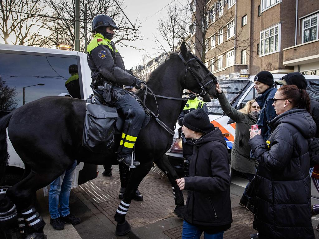 Police disperse protesters gathering at the Binnenhof in The Hague, the Netherlands. Picture: AFP / Netherlands OUT