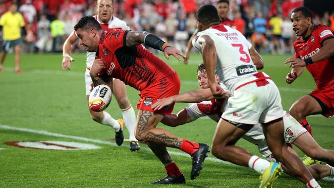 Referee Matt Cecchin was the subject of vile social media abuse after he disallowed a try to Tonga's Andrew Fifita (L) in the dying stages of the World Cup semi-final against England despite making the correct decision that the front-rower loses the ball. AFP PHOTO / MICHAEL BRADLEY