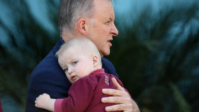 Federal Opposition Leader Anthony Albanese and Dash, the son of Member for Lilley Anika Wells. Dash likes to grab phones and has pretty good aim. Picture: Dan Peled/NCA NewsWire