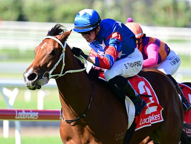 Rockhampton rocket Chinny Boom darts clear under jockey Ben Thompson to win at Doomben. Picture: Grant Peters - Trackside Photography