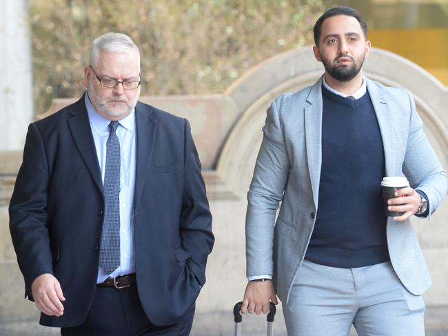 Stuart Robert Van Dyken (Left) and his instructing solicitor Mohamad Sakr at Downing Centre Court today. Picture: Jeremy Piper