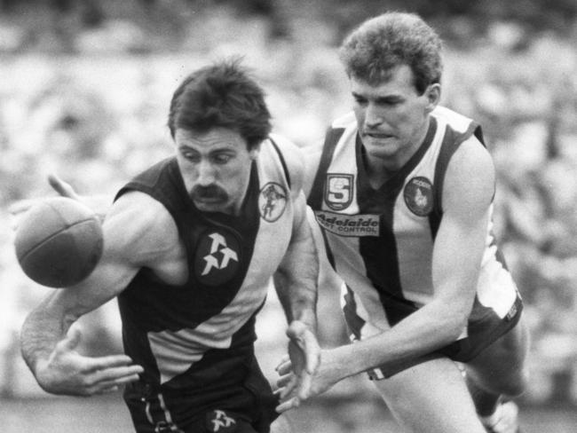 John Riley (right) in 1985 after returning to North Adelaide, playing Glenelg in a second semi-final.