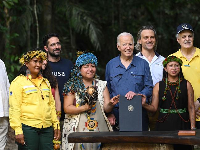 US President Joe Biden signs a proclamation designating November 17 as International Conservation Day during his visit to the Amazon. Picture: AFP