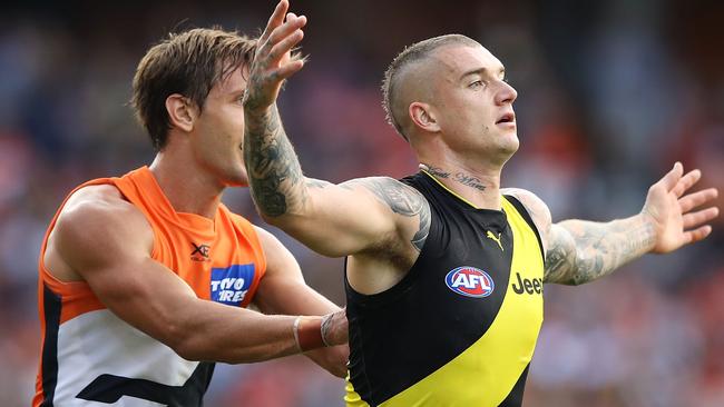 Dustin Martin receives some close attention from Giants opponent Matt de Boer last Saturday. Picture: Getty Images