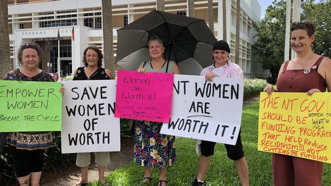 Sally Endemann, Case Pearson, Katherine Marchment, Rocket Bretherton and Noelene Armstrong protesting funding cuts to the Women of Worth program. Picture: Madura McCormack