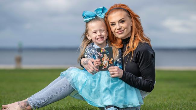 Corio mum Kandace Lane, with her daughter Gypsy, is raising awareness for the dangers of strangulation in the home after her sister Tahlee Rose Strachan, in photograph, died 21 years ago. Picture: Brad Fleet