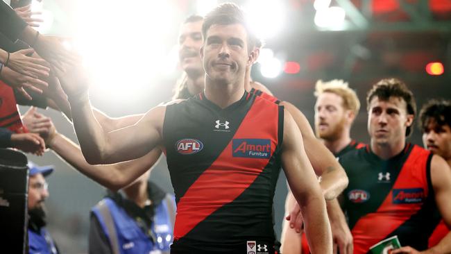 Bombers skipper Zach Merrett leads his team off Marvel Stadium. Pic: Michael Klein