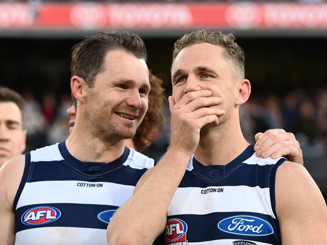 MELBOURNE, AUSTRALIA - SEPTEMBER 24: Patrick Dangerfield and Joel Selwood of the Cats celebrate winning the 2022 AFL Grand Final match between the Geelong Cats and the Sydney Swans at the Melbourne Cricket Ground on September 24, 2022 in Melbourne, Australia. (Photo by Quinn Rooney/Getty Images)